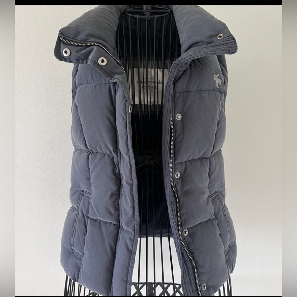 Beautiful vest. Lightly used. Very flattering. Really keeps you warm in the cold